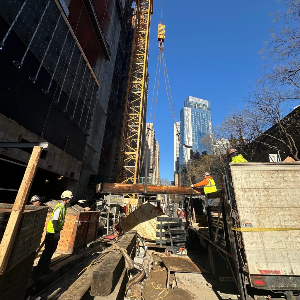 Workers from Andrew Horan Alba learning controlled demolition techniques during training session.
