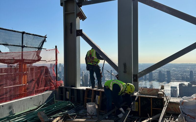 Andrew Horan Alba overseeing NYC construction site operations with modern equipment and safety protocols