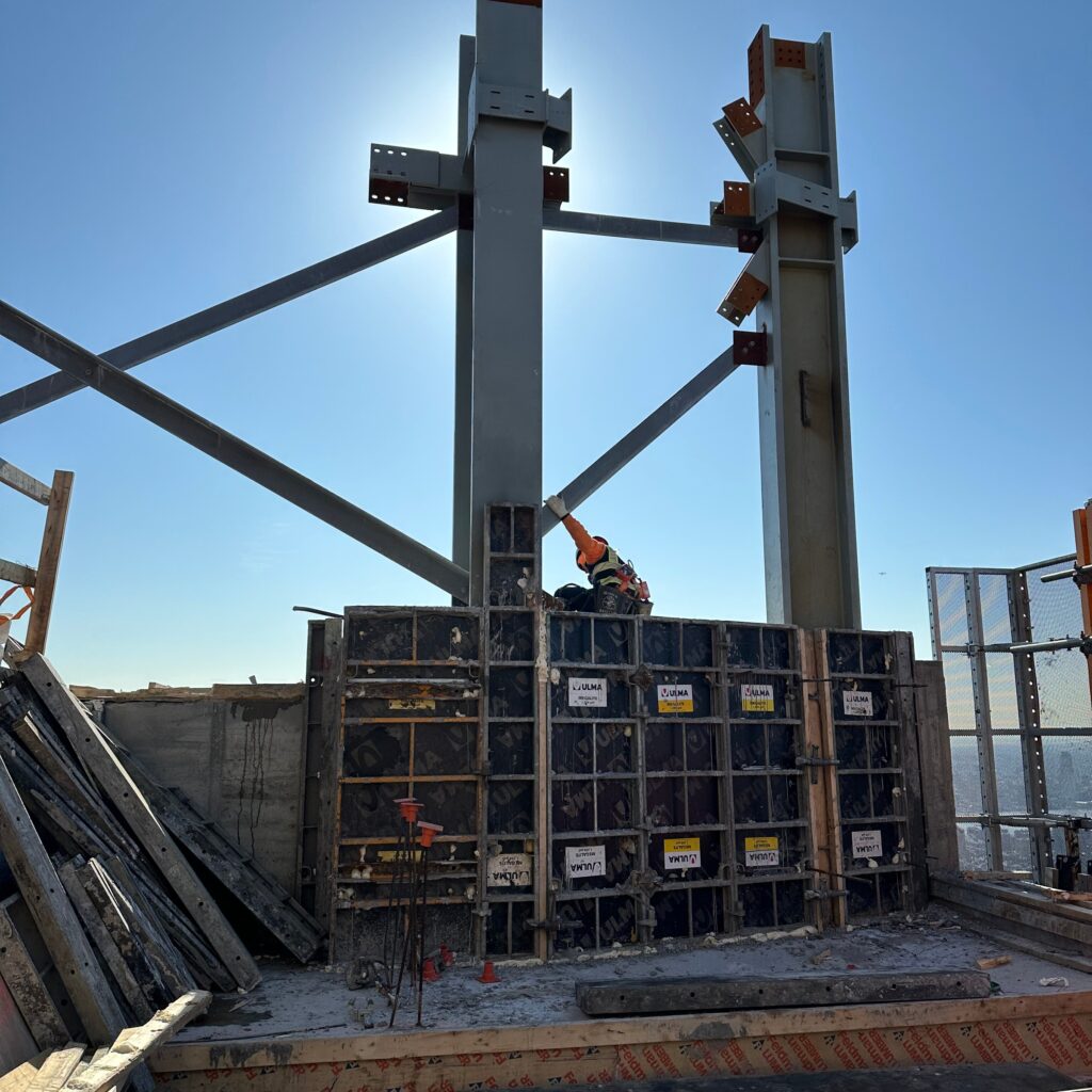 Workers from Andrew Horan Alba learning controlled demolition techniques during training session.