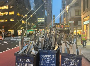 Andrew Horan Alba guiding a construction and demolition team on a New York City job site with skyscrapers in the background.