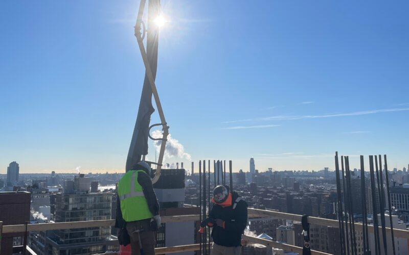 “Andrew Horan Alba managing a New York City demolition and construction site with professional crews and modern safety equipment.”
