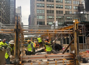 “Andrew Horan Alba managing a New York City demolition and construction site with professional crews and modern safety equipment.”