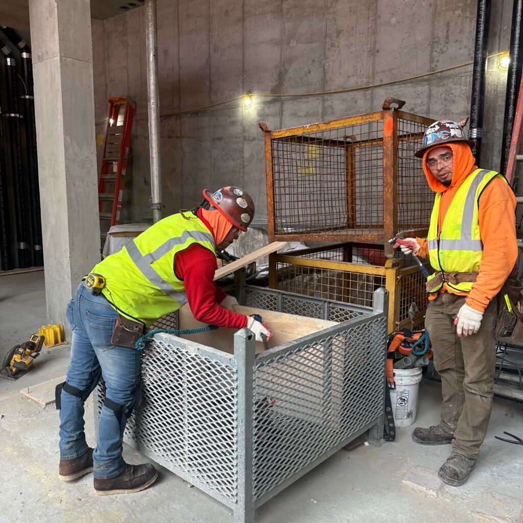 “Andrew Horan Alba managing a New York City demolition and construction site with professional crews and modern safety equipment.”